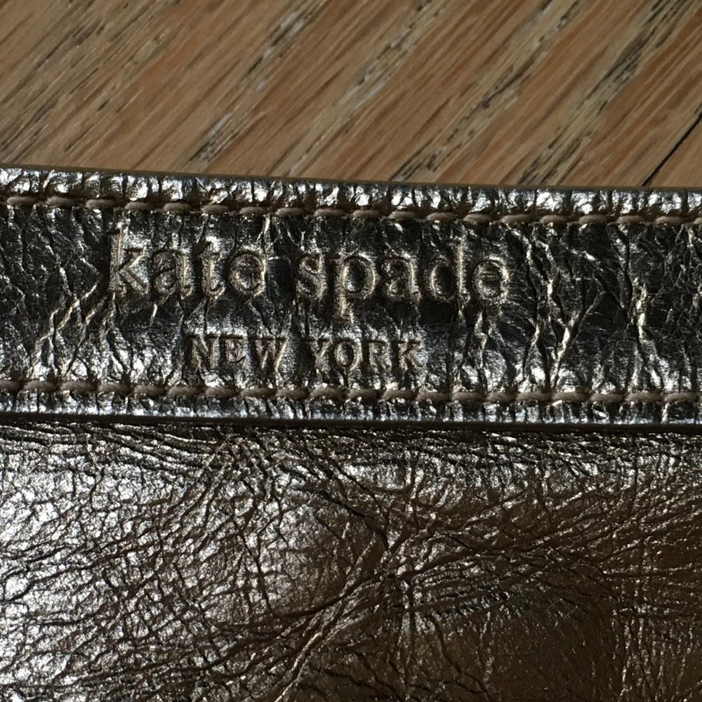 Kate Spade gold zip clutch